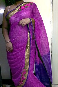 Indian homemaker stripping her traditional indian outfits