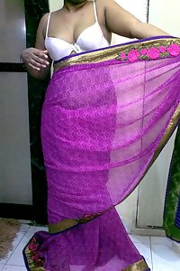 Indian homemaker stripping her traditional indian outfits