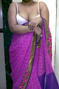 Indian homemaker stripping her traditional indian outfits