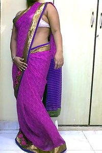 Indian homemaker stripping her traditional indian outfits