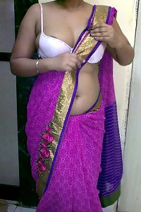 Indian homemaker stripping her traditional indian outfits