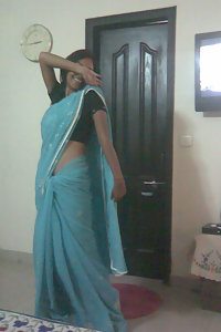 Indian babe taking shower posing