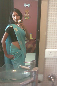 Indian babe taking shower posing