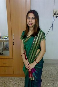 Sexy Indian Bhabhi Kusum Posing Hot On Camera